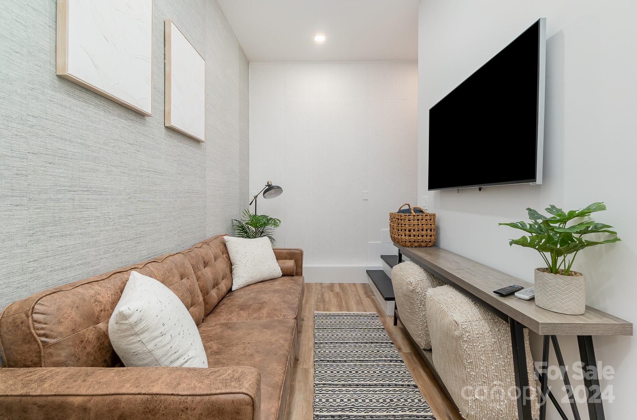 2070 Applebrook Drive Monroe, NC 28110 - Photo 23 of 35 a living room with furniture and a flat screen tv