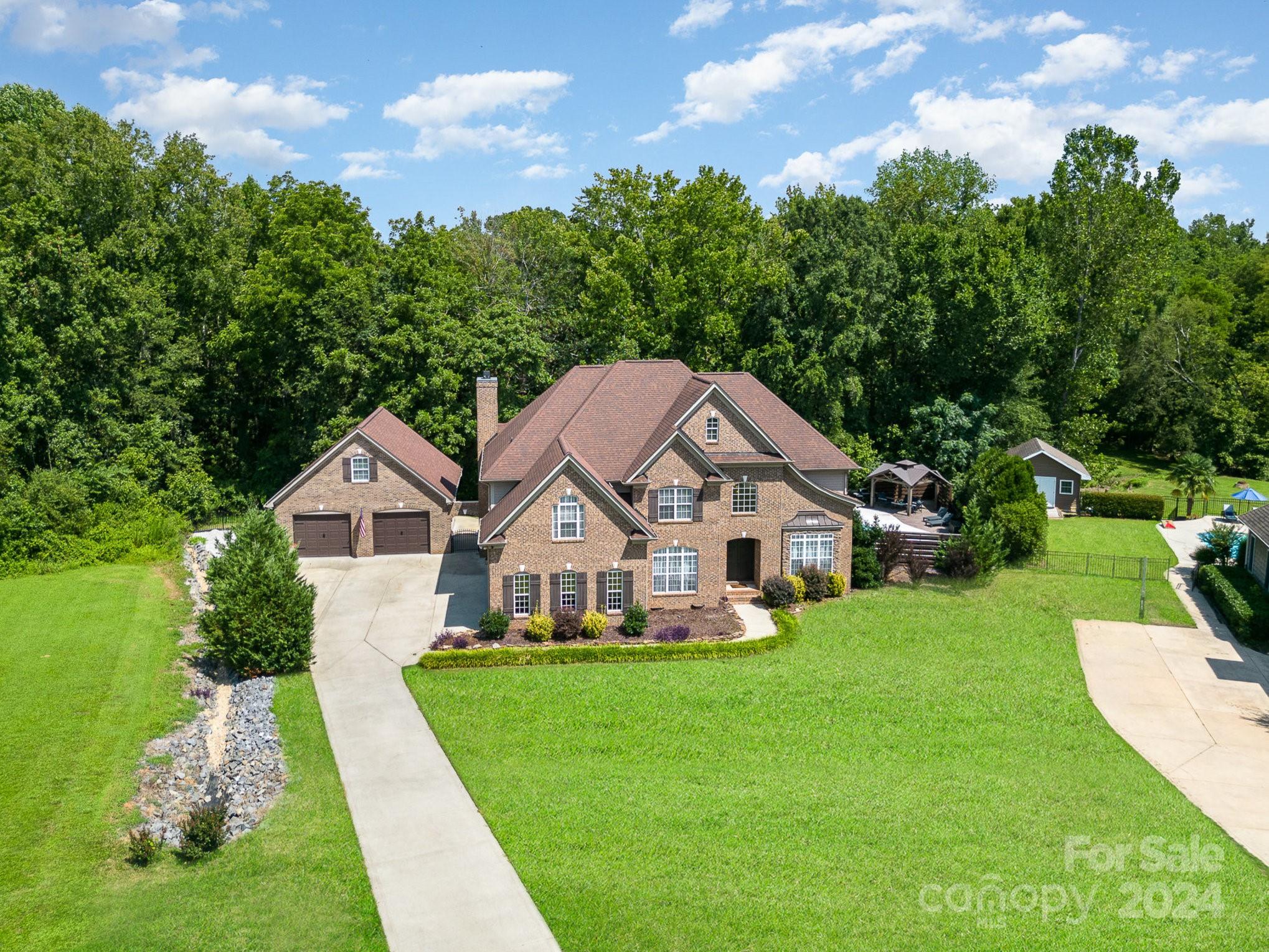 2070 Applebrook Drive Monroe, NC 28110 - Photo 33 of 35 a front view of a house with garden