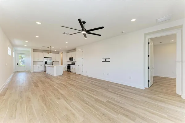 a bathroom with a shower and a sink