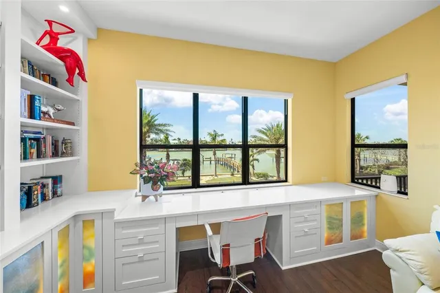 a bedroom with two beds and a chandelier