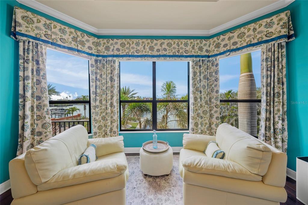 471 Bayshore Road Nokomis, FL 34275 - Photo 19 of 95 a living room with furniture and a large window