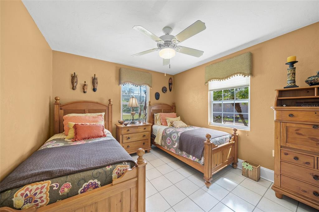 471 Bayshore Road Nokomis, FL 34275 - Photo 44 of 95 a bedroom with a bed and window