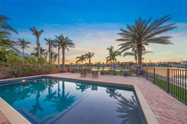 an aerial view of a houses with ocean view
