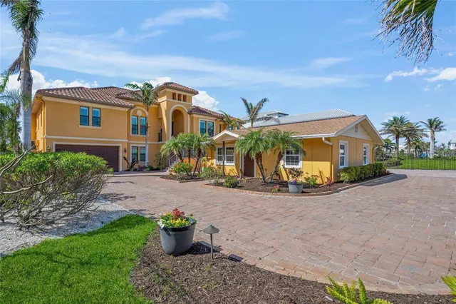 a living room with furniture and a book shelf