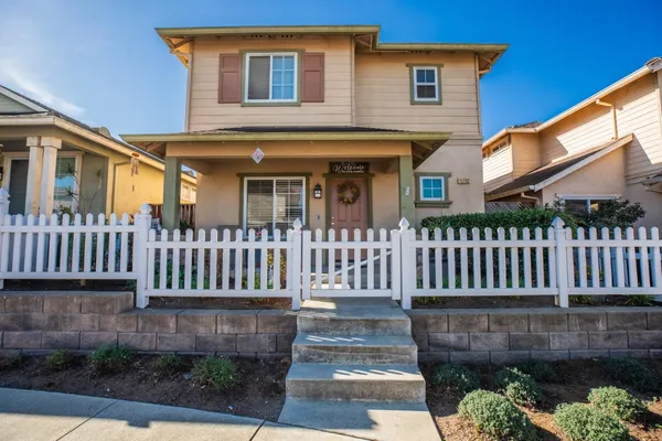 a front view of a house with a porch