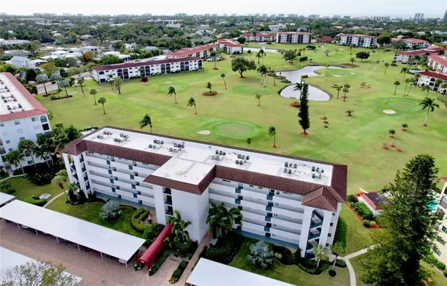 an aerial view of a house with a garden