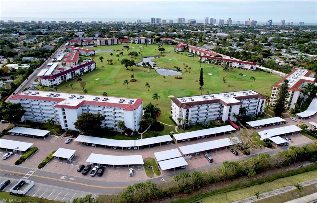 29 High Point Circle East, Unit 308 Naples, FL 34103 - Photo 26 of 39 an aerial view of a