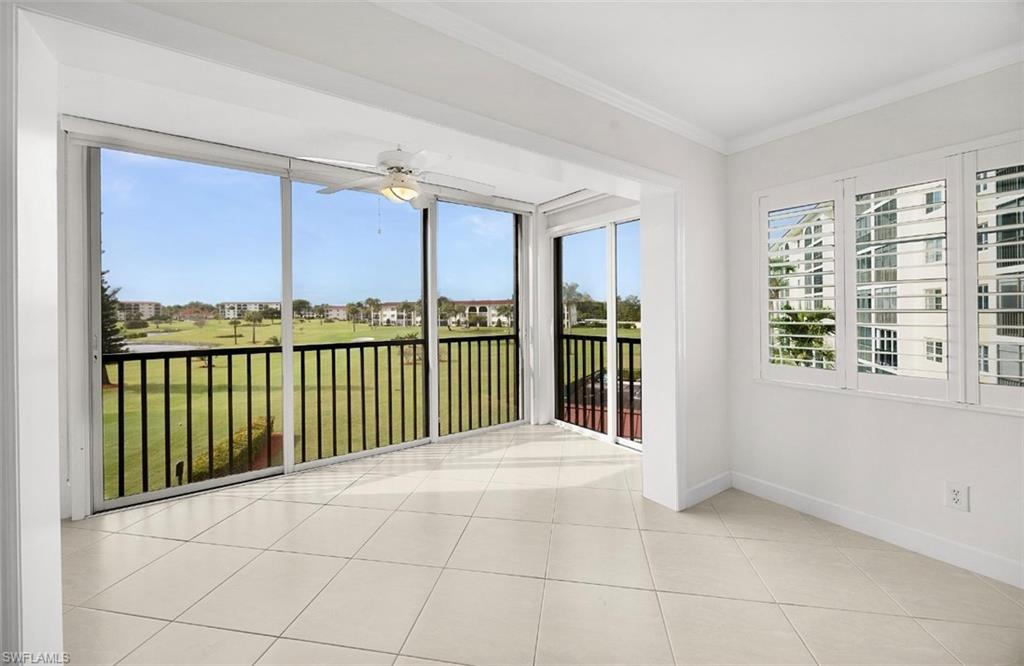 29 High Point Circle East, Unit 308 Naples, FL 34103 - Photo 3 of 39 a view of a balcony with an outdoor space