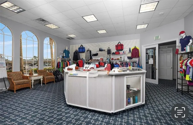 a view of living room with furniture and a flat screen tv