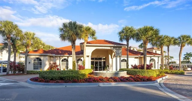 front view of a house with a garden