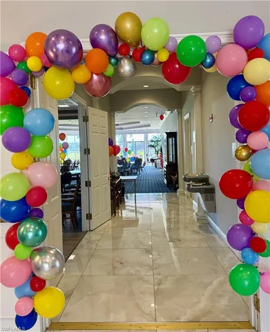 a view of a dining area with lots of fruit and fruits