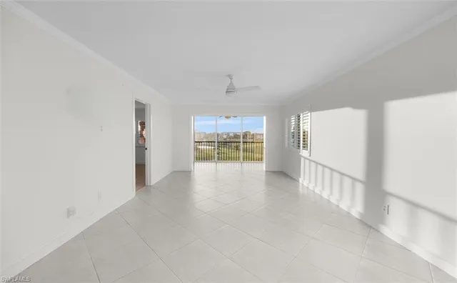 wooden floor in an empty room with a fireplace