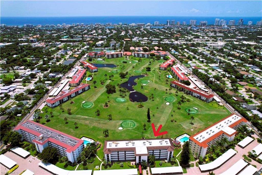 29 High Point Circle East, Unit 308 Naples, FL 34103 - Photo 7 of 39 an aerial view of multiple house