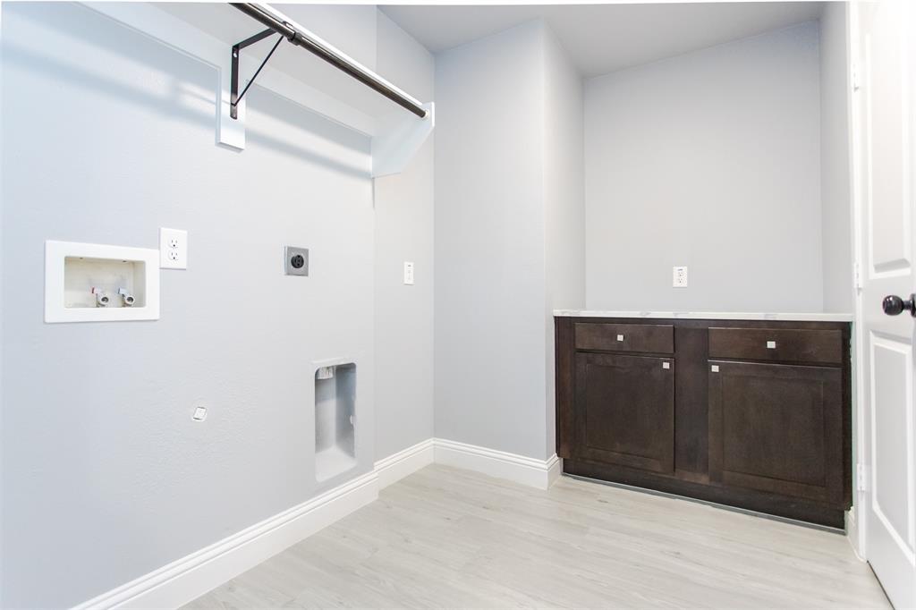 415 West Elm Street, Unit 415 Denison, TX 75020 - Photo 6 of 17 a view of an empty room