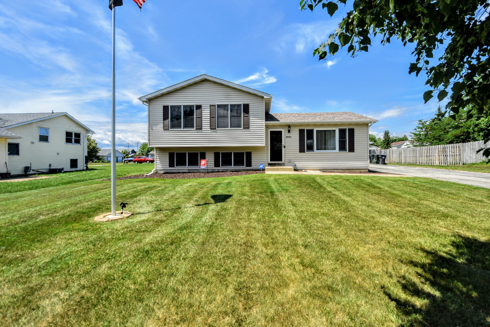 4002 Ridge Road Zion, IL 60099 - Photo 2 of 26 a house that has a big yard