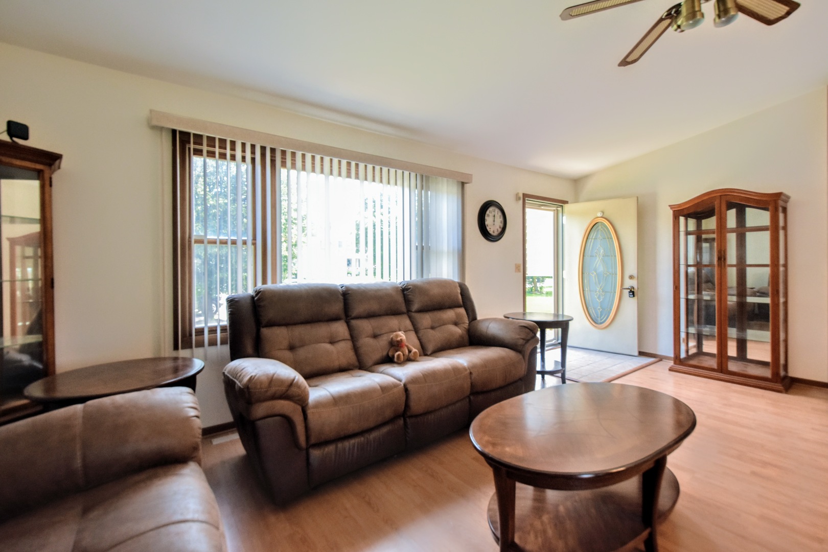 4002 Ridge Road Zion, IL 60099 - Photo 7 of 26 a living room with furniture a window and a potted plant