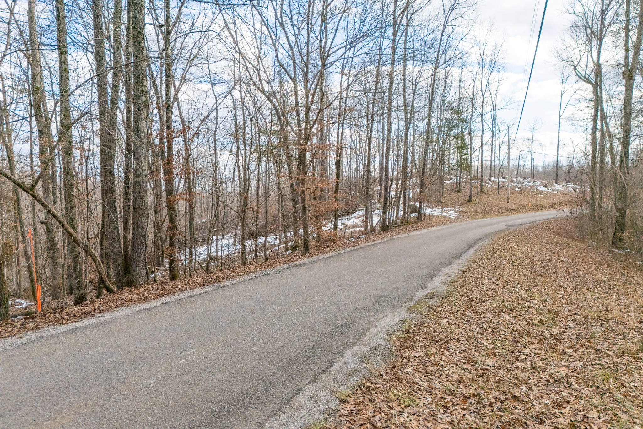 0 Hutchins Bend Road Sparta, TN 38583 - Photo 5 of 12 a close up of a road with a building in the background