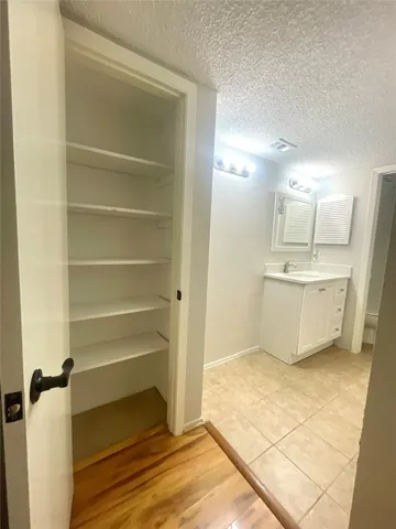 a view of a kitchen with a sink