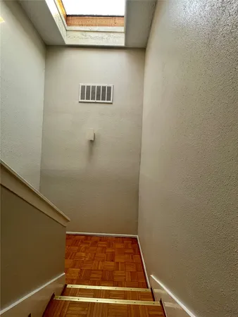 a view of a room with rack on the wall