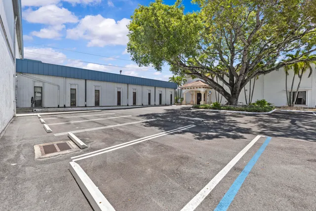 a view of outdoor space with yard and garage