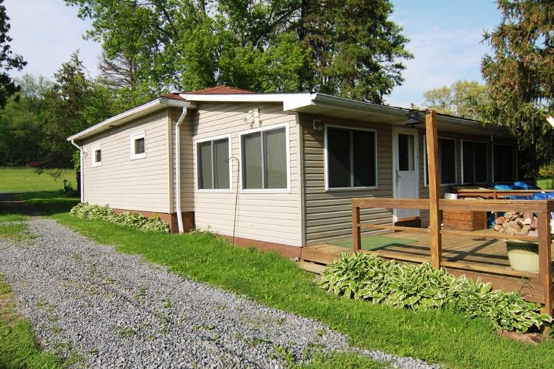 146 Love Road Valencia, PA 16059 - Photo 3 of 23 Right Side, Rear Sides, and 16' x 12' Rear Deck from Driveway: