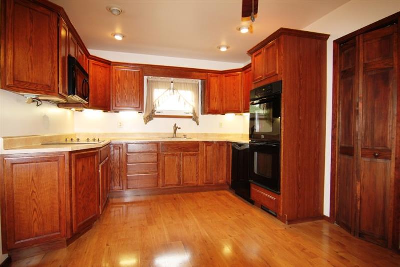 146 Love Road Valencia, PA 16059 - Photo 8 of 23 Newer Kitchen (Left Side): Includes Double Oven, Electric Cook Top, Built In Microwave Oven, and Dishwasher. Ceiling Fan, Under Counter Lighting, and Recessed Ceiling Lights.