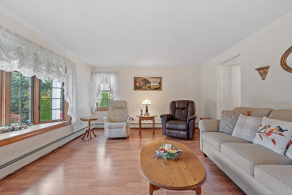 252 Great Road Shirley, MA 01464 - Photo 14 of 42 a living room with furniture and a large window
