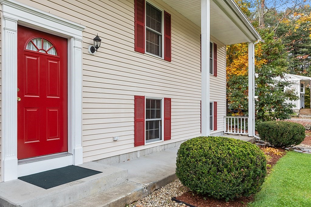 252 Great Road Shirley, MA 01464 - Photo 3 of 42 a view of a house with a door and wooden walls