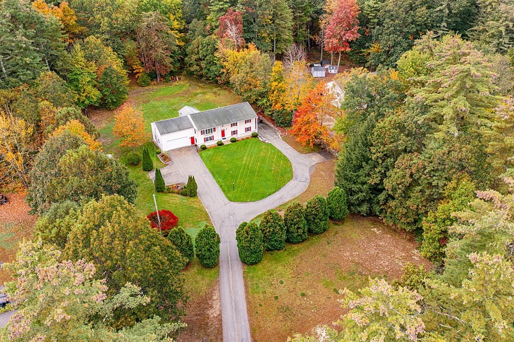 252 Great Road Shirley, MA 01464 - Photo 41 of 42 an aerial view of a house with a yard and trees all around