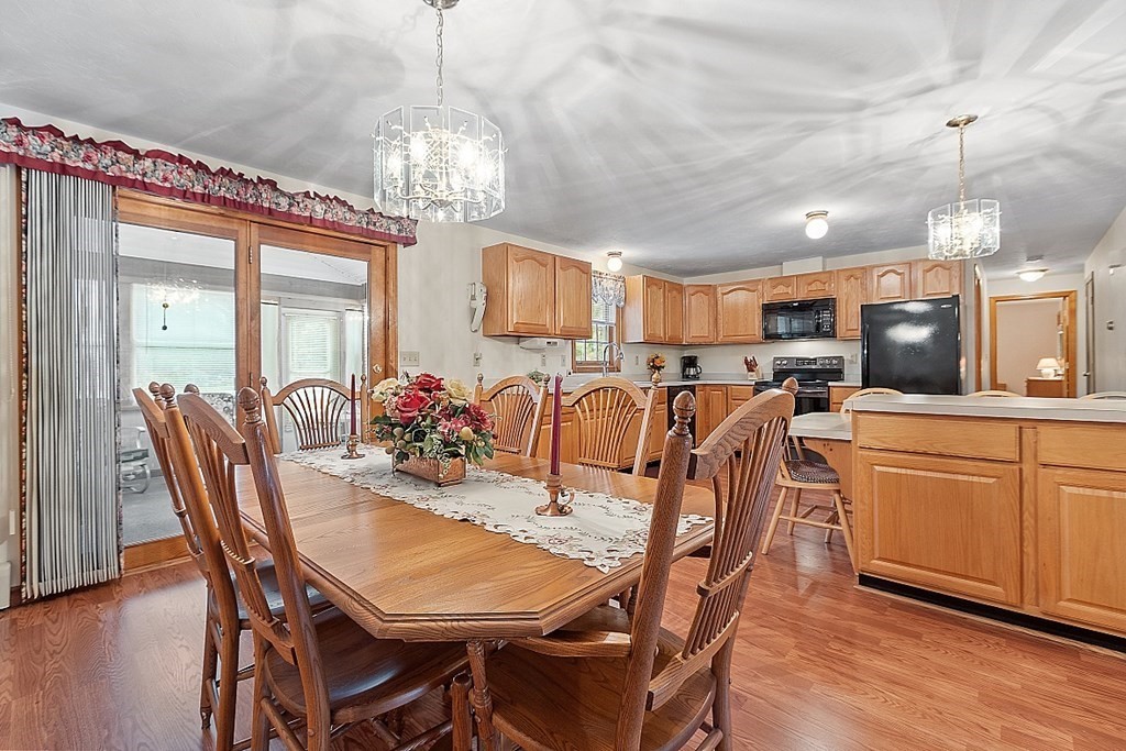 252 Great Road Shirley, MA 01464 - Photo 5 of 42 a view of a dining room with furniture window and wooden floor