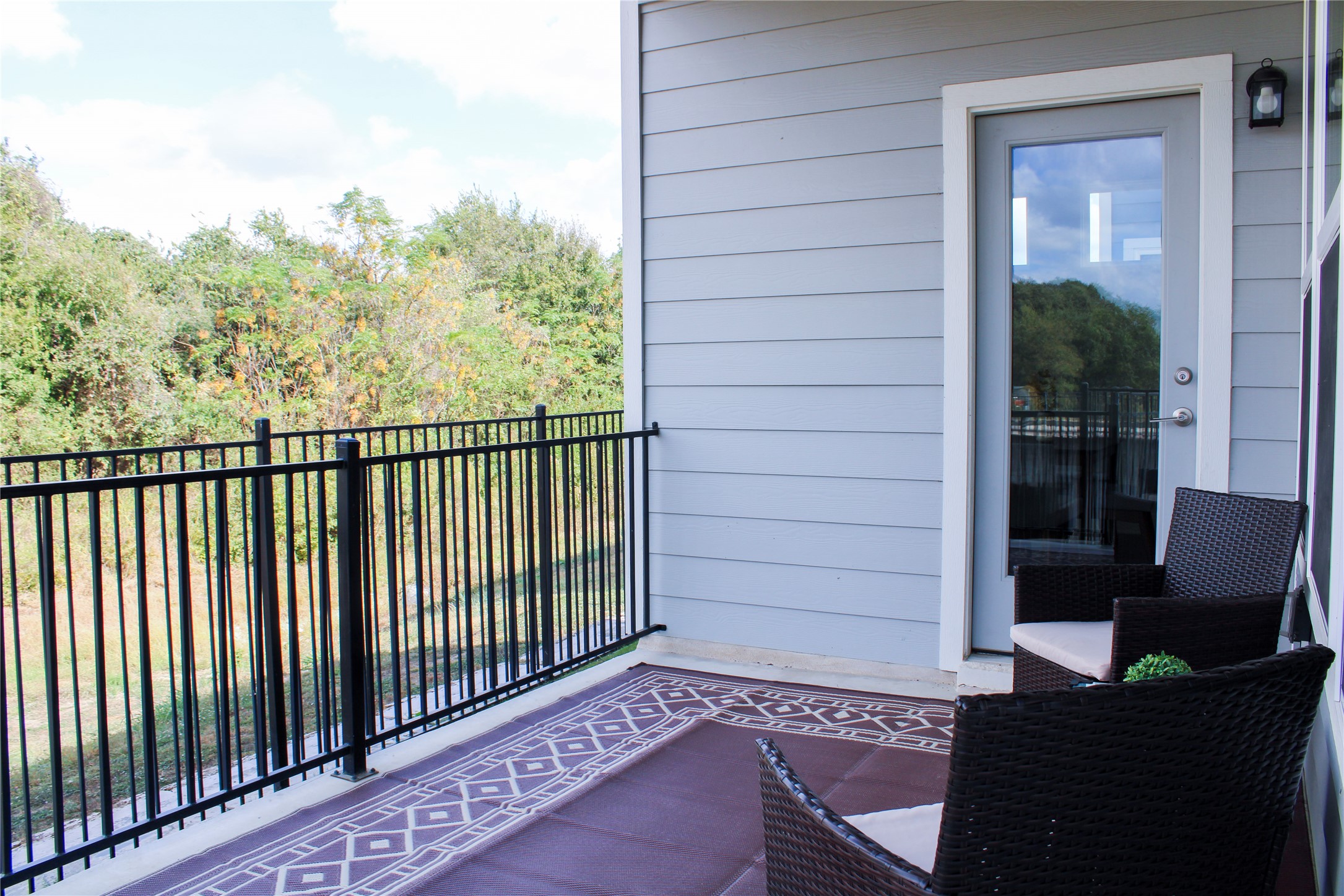 1007 Harwell Loop Kyle, TX 78640 - Photo 31 of 40 a view of a balcony with chair