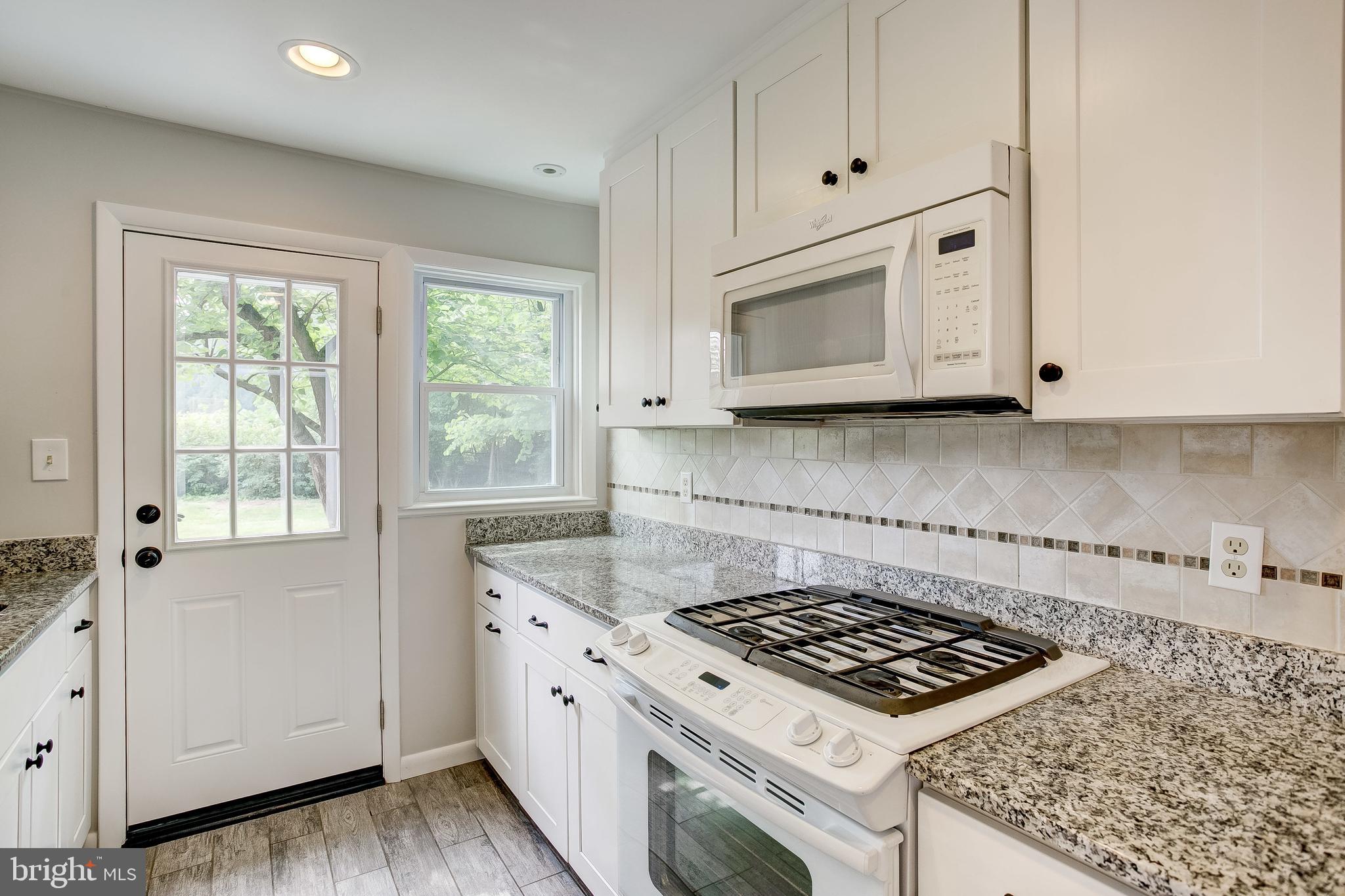 7008 Plymouth Road Baltimore, MD 21208 - Photo 11 of 43 Bright sunny kitchen