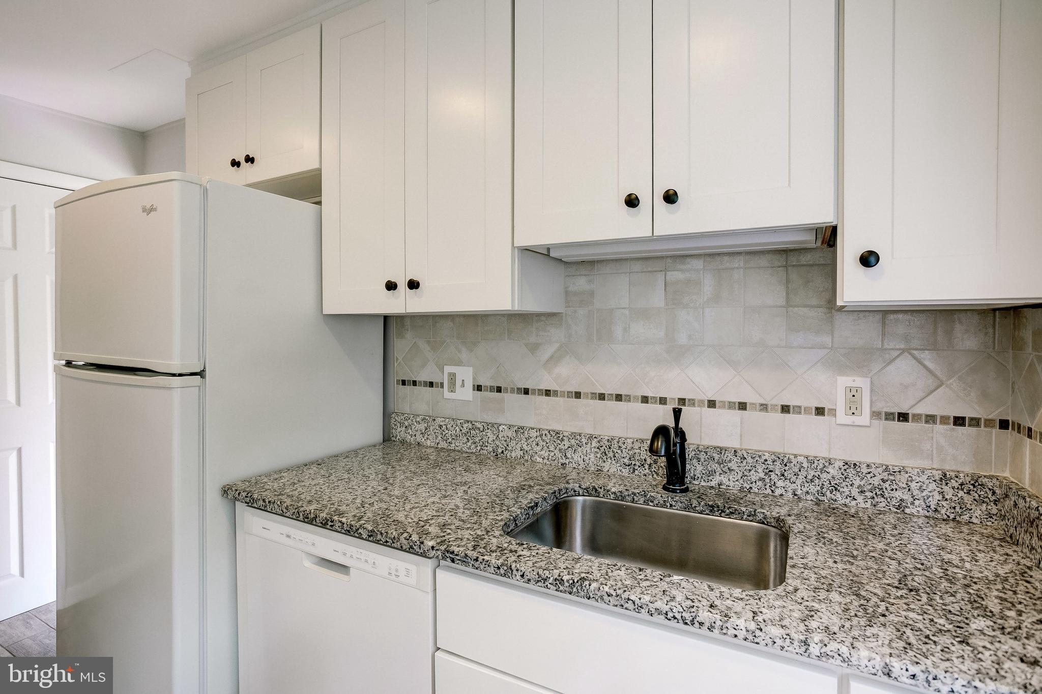 7008 Plymouth Road Baltimore, MD 21208 - Photo 12 of 43 Lovely white kitchen