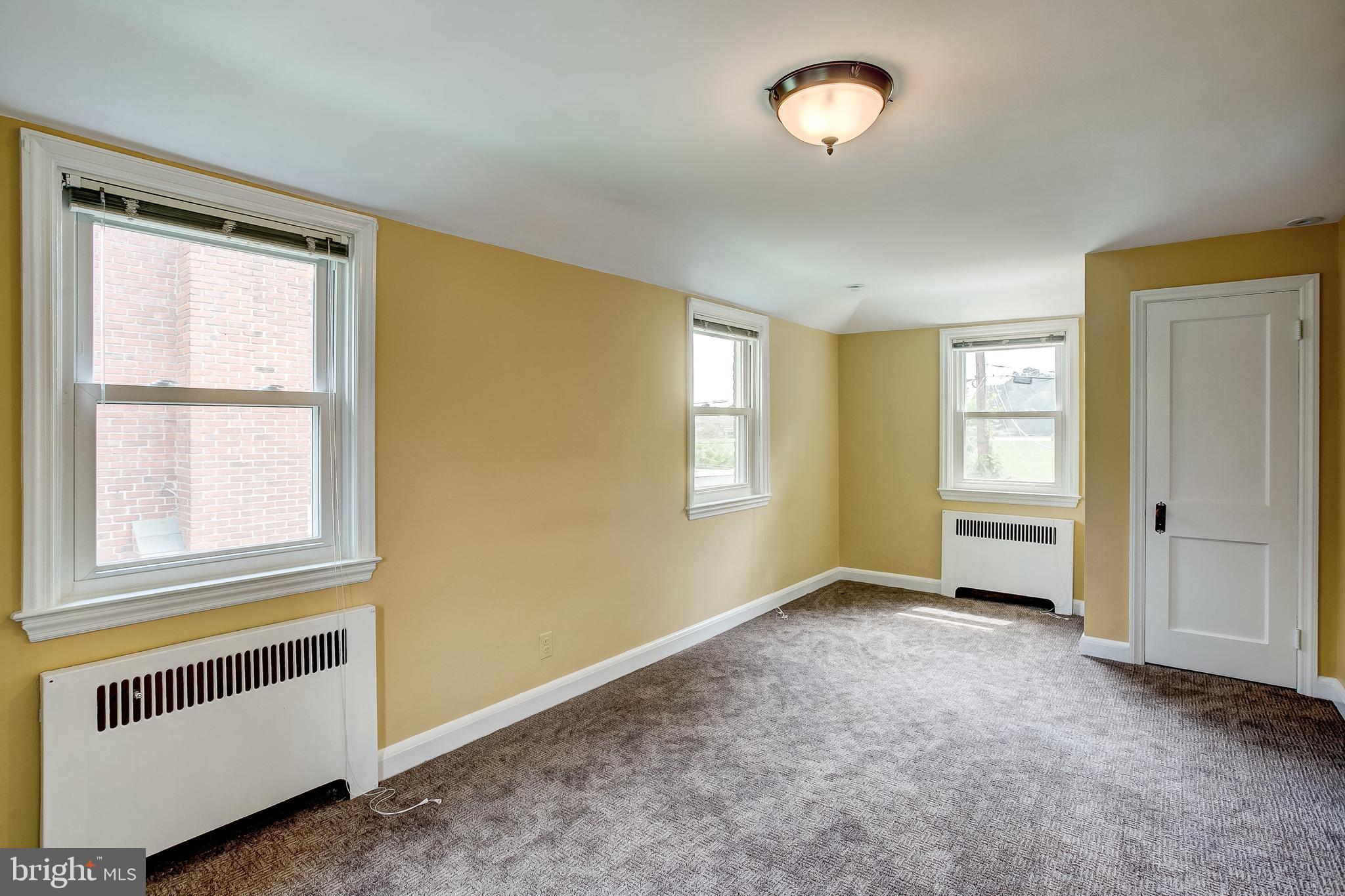 7008 Plymouth Road Baltimore, MD 21208 - Photo 21 of 43 Bedroom 1 with tons of windows