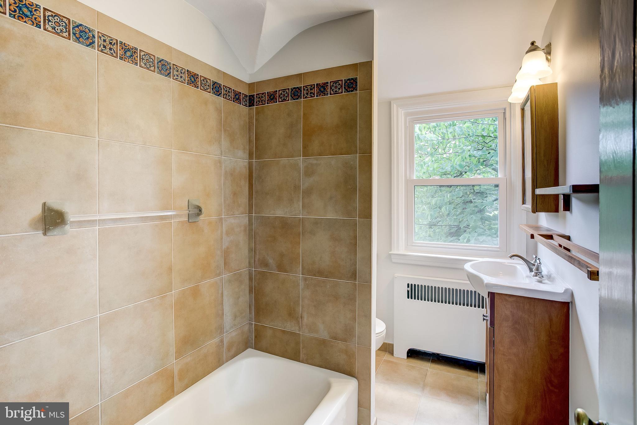 7008 Plymouth Road Baltimore, MD 21208 - Photo 30 of 43 Bath with tub for relaxing soaking