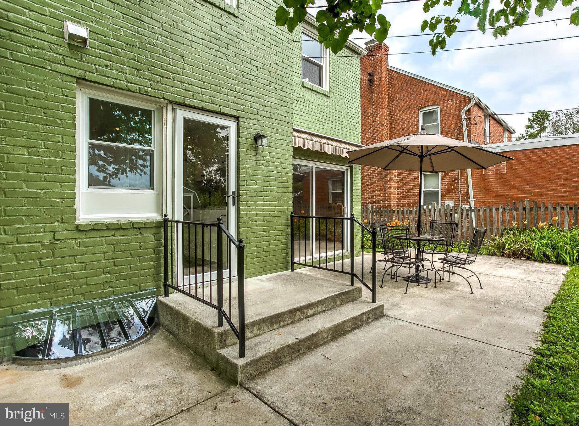 7008 Plymouth Road Baltimore, MD 21208 - Photo 37 of 43 Outside kitchen, porch leads to patio