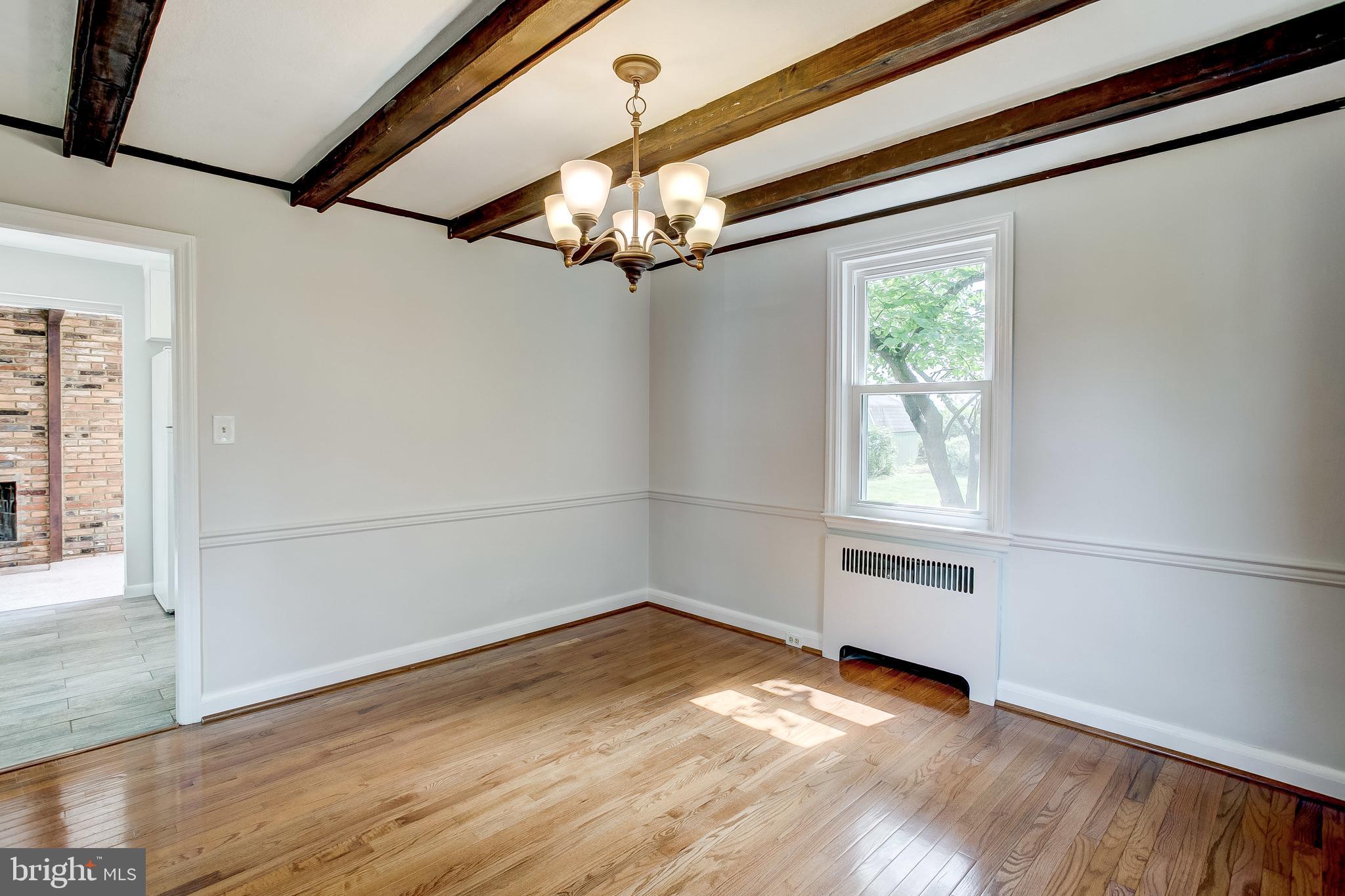7008 Plymouth Road Baltimore, MD 21208 - Photo 10 of 43 Dining room leads to kitchen