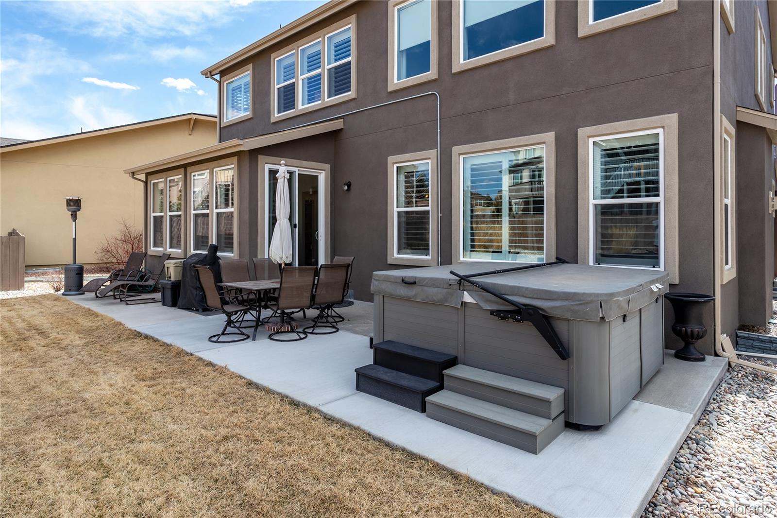 4208 Notch Trail Colorado Springs, CO 80924 - Photo 39 of 40 a view of a house with sitting area and furniture