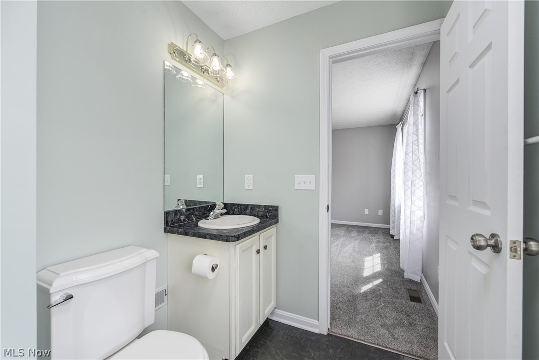 33990 Harding Avenue North Ridgeville, OH 44039 - Photo 23 of 37 Ensuite with view of bedroom