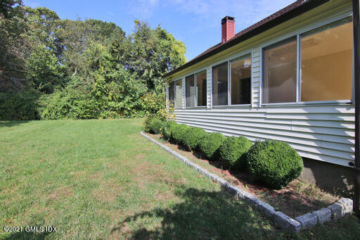 Undisclosed Address Riverside, CT 06878 - Photo 25 of 28 a view of a back yard of the house