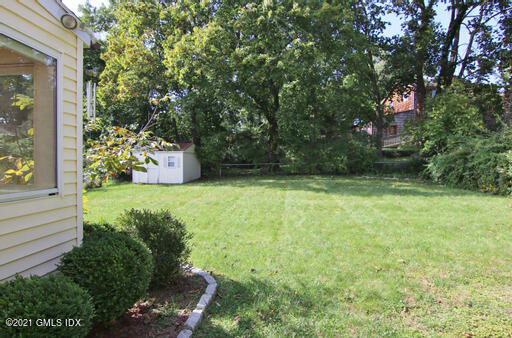 Undisclosed Address Riverside, CT 06878 - Photo 26 of 28 a view of a garden