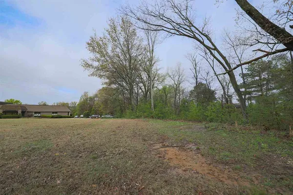 a view of an outdoor space with a lake view
