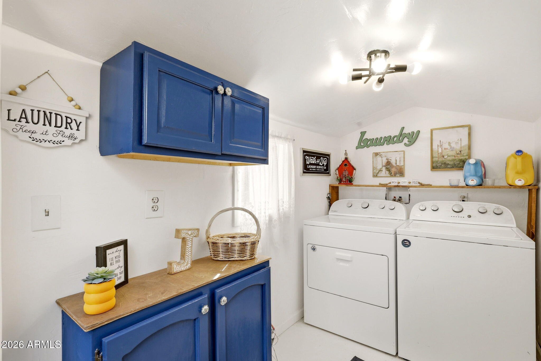 2112 Fishermans Road Overgaard, AZ 85933 - Photo 13 of 18 a utility room with closet and dryer