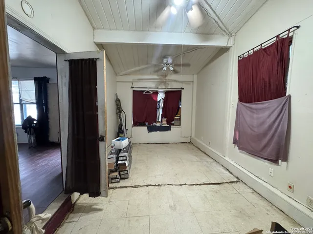 a view of lobby with furniture and a fireplace