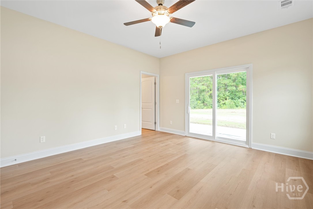1138 Hanover Lane Townsend, GA 31331 - Photo 17 of 39 A sliding door leads to the covered patio.
