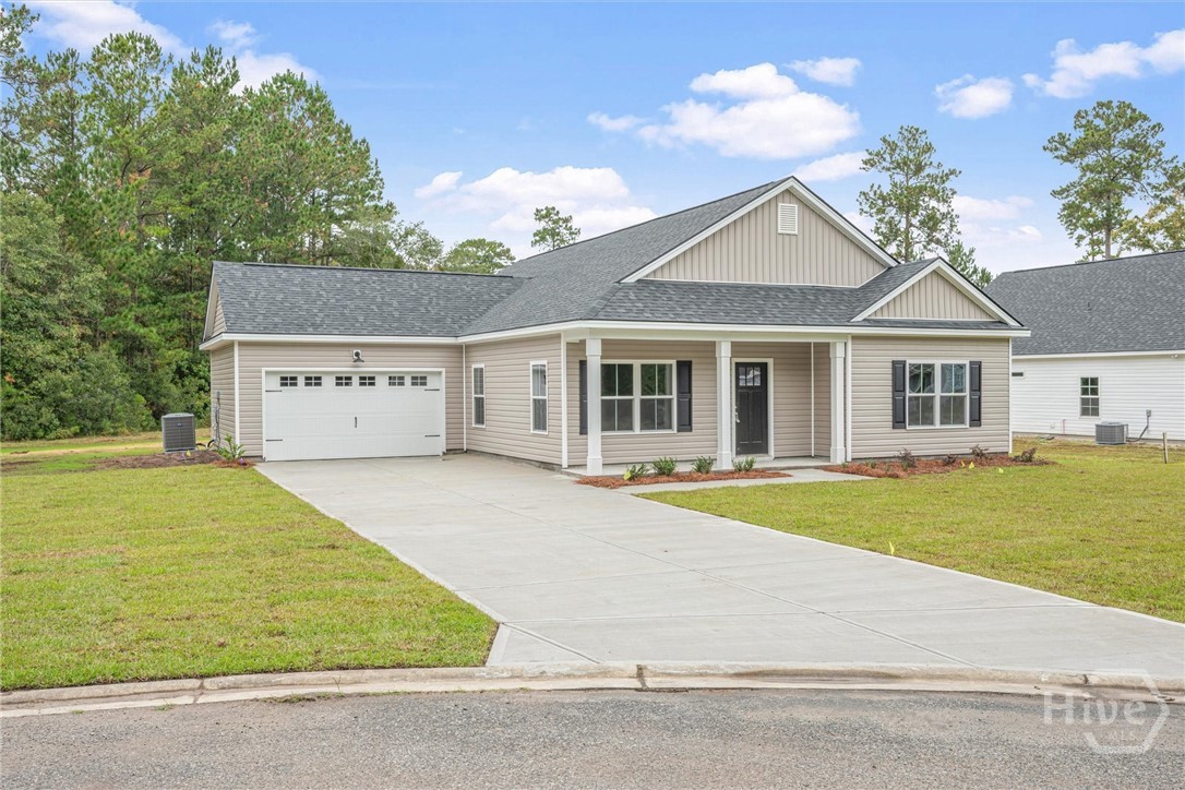 1138 Hanover Lane Townsend, GA 31331 - Photo 34 of 39 Attached garage and central heating and air. Front yard zoned irrigation.