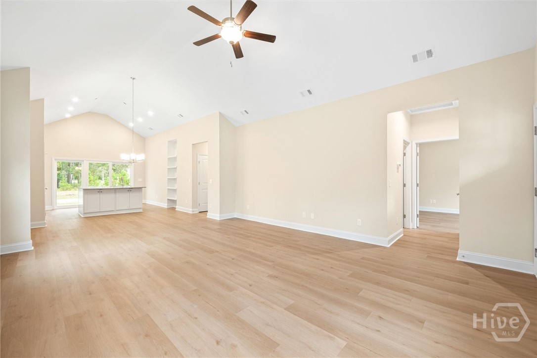 1138 Hanover Lane Townsend, GA 31331 - Photo 7 of 39 Great room with vaulted ceiling and lighted fan.