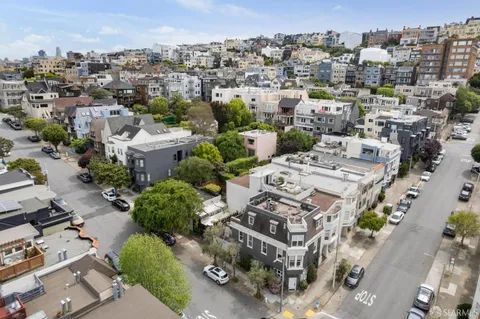 an aerial view of a city with lots of residential buildings