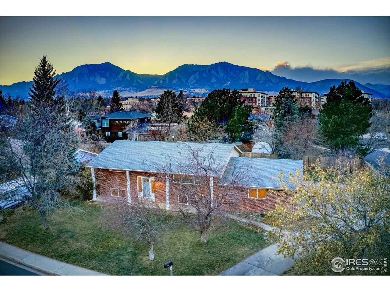 385 Manhattan Drive Boulder, CO 80303 - Photo 1 of 28 a view of a house with a mountain view