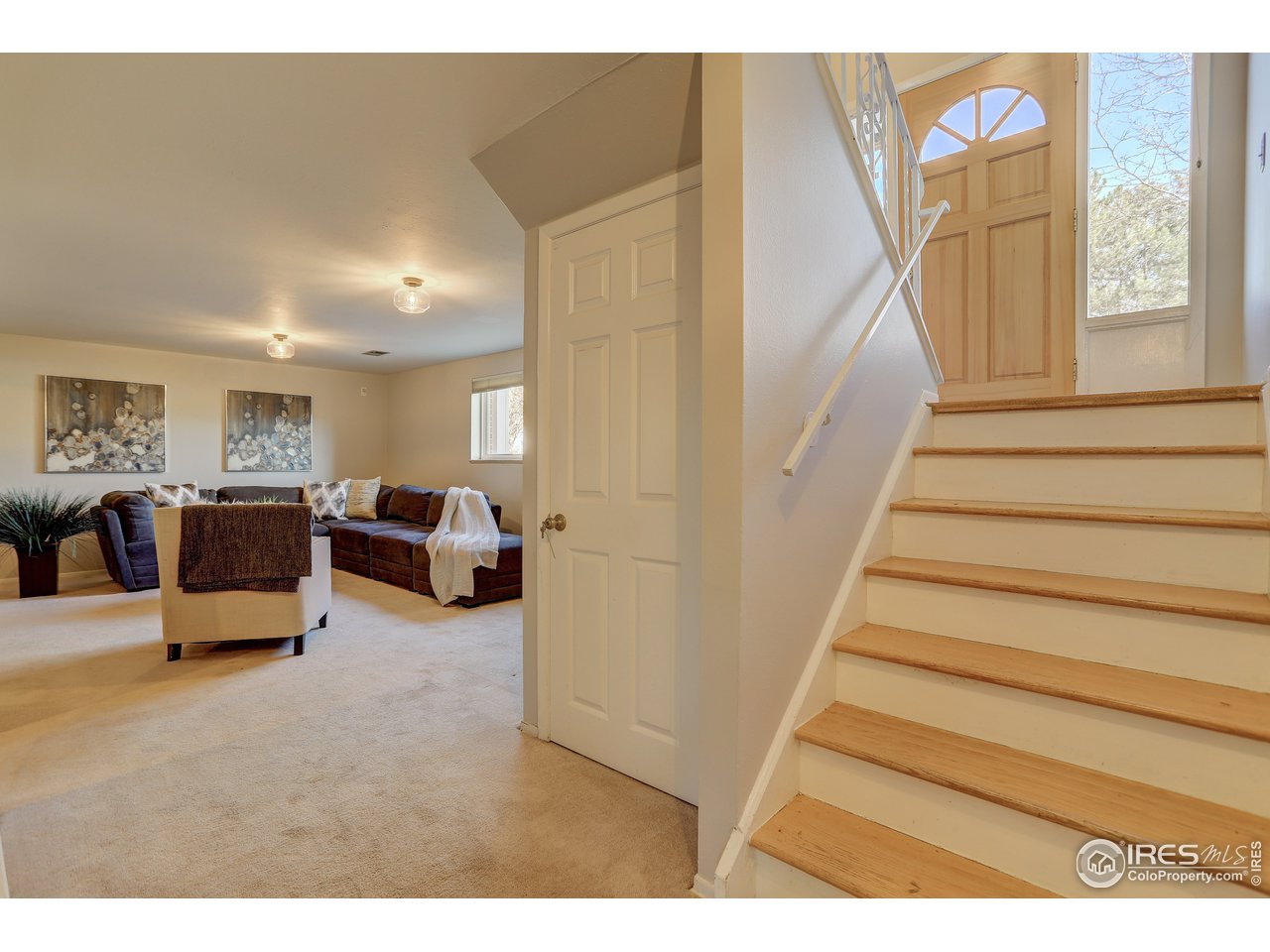385 Manhattan Drive Boulder, CO 80303 - Photo 17 of 28 a living room with furniture and a painting